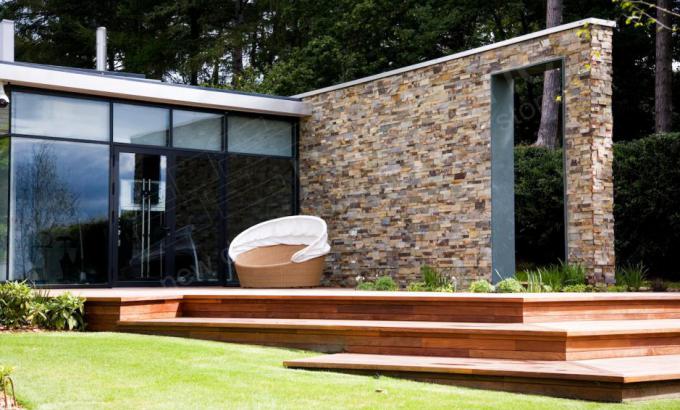 Norstone Large Format XL Series Rock Panel used as stone siding on a modern home in the UK